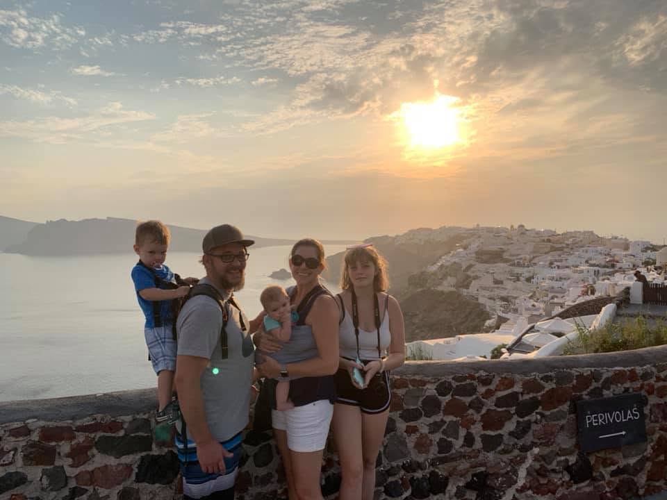 Our family at sunset in Santorini, Greece